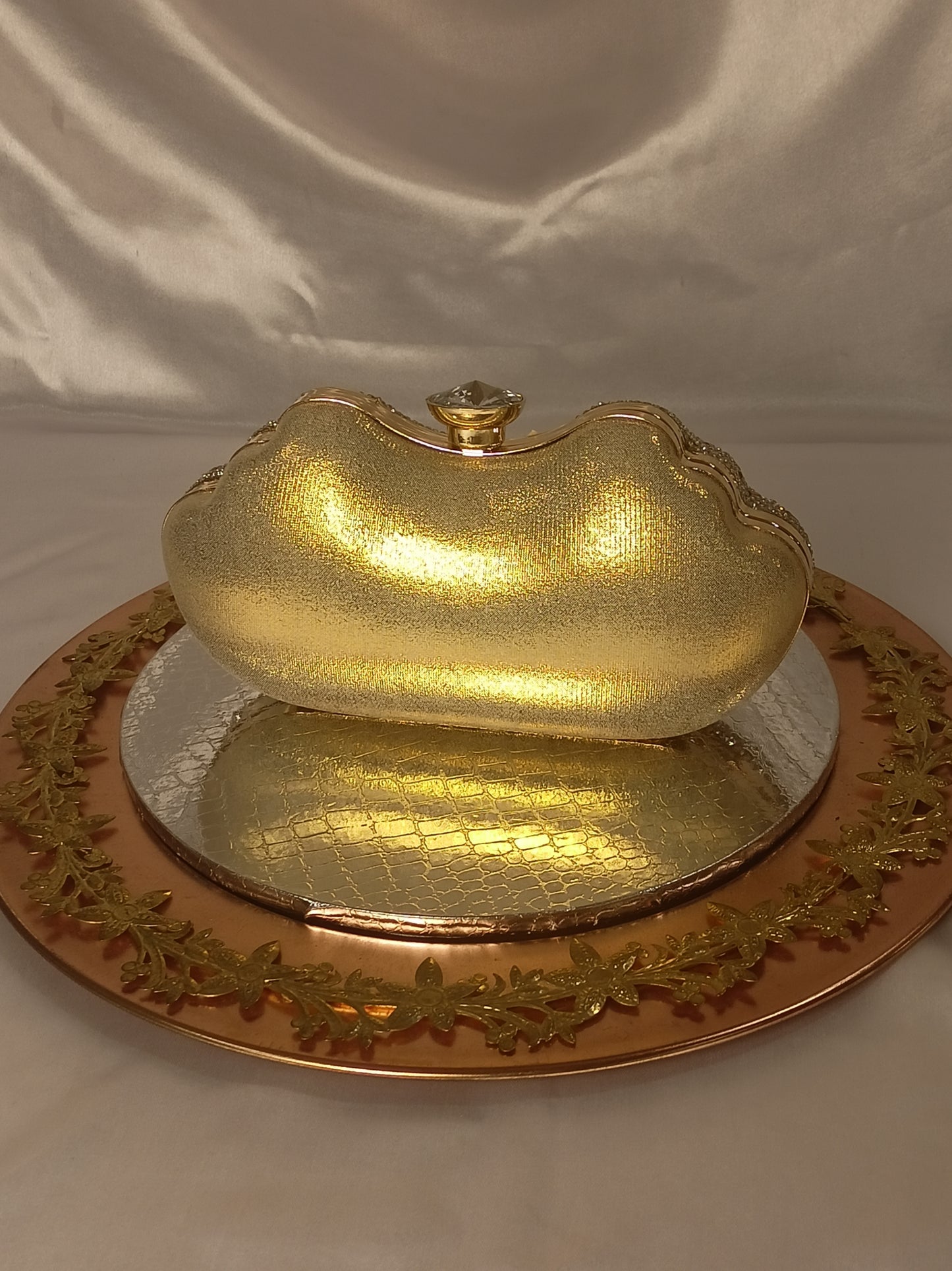 GOLDEN CLUTCH WITH D SHAPE