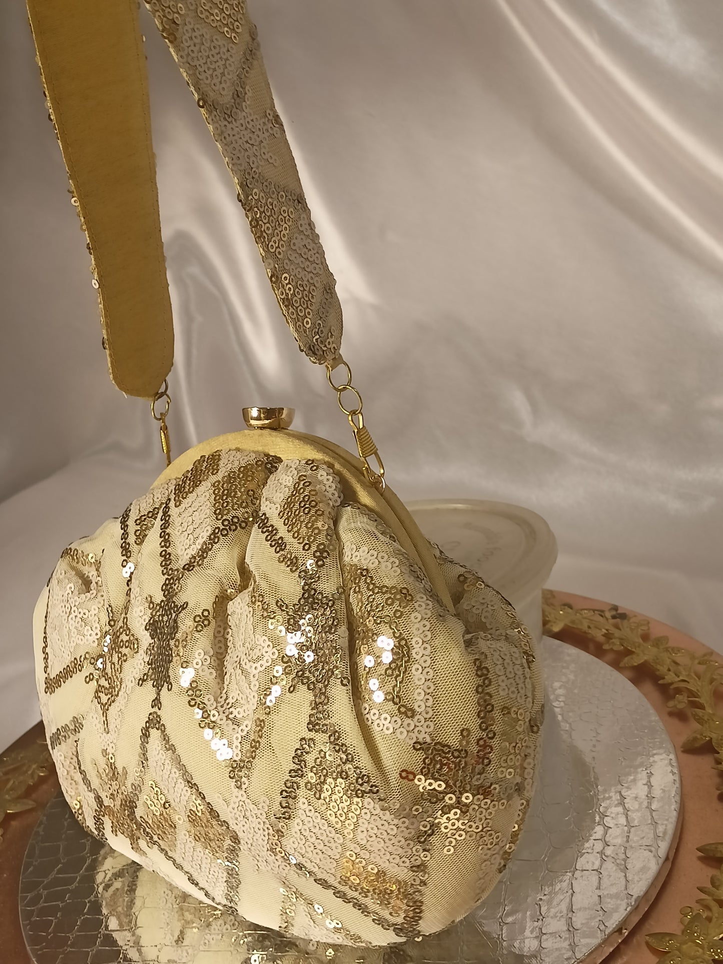 CREAM GOLDEN BATUA CLUTCH