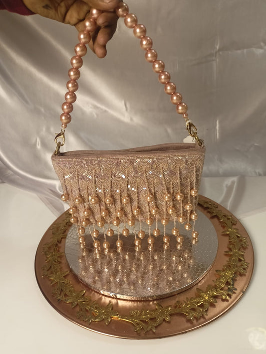 ROSE GOLD PEARL CLUTCH BAG